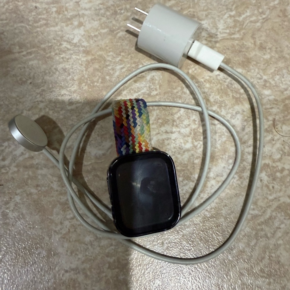 Apple Smartwatch with Multicolor Band and White Charger